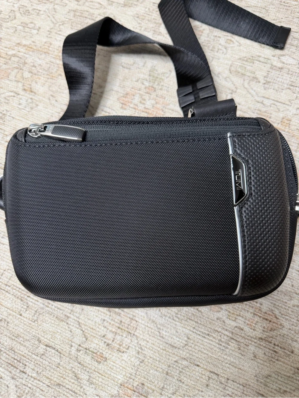 Tumi Black Men's Sling Belt Bag with Silver Accents